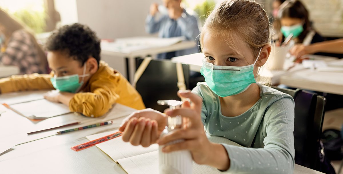 Kids wearing face masks in school.